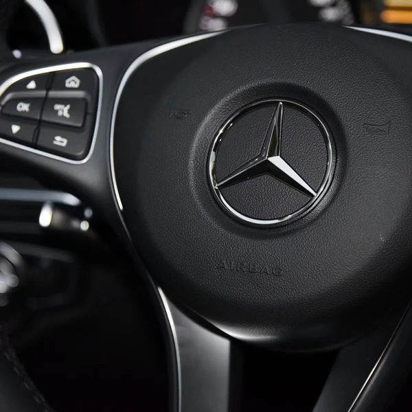 Емблема керма Mercedes-Benz чорна глянцева 57 мм пластик (на напрямних) 94776 фото