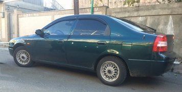 Дефлекторы окон ветровики Kia Shuma I 1996-2001 K12796 фото