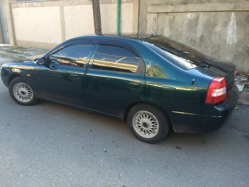 Дефлекторы окон ветровики Kia Shuma I 1996-2001 K12796 фото