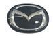 Эмблема решетки Mazda CX-30 черная Хром 140х110 мм под стеклом (на направляющих) 95877 фото 1