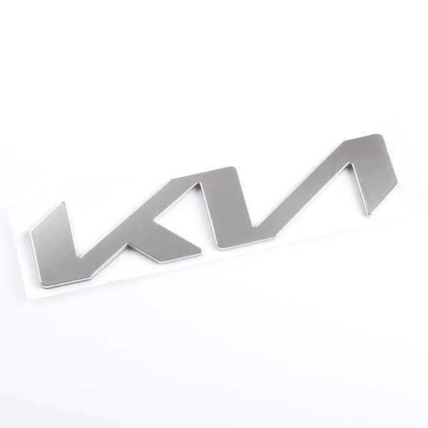 Емблема-напис Kia NEW GRAY 130x30 мм металева на скотчі (заводська) 88583 фото