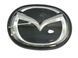 Эмблема решетки Mazda 6 (2011-2016г) черная Хром 141х112 мм под стеклом (на направляющих) 95888 фото 1