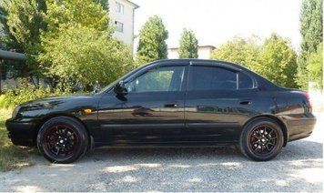 Дефлектори вікон вітровики для Hyundai Elantra седан 2000-2006 H20200 фото