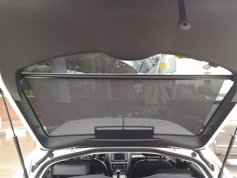 Шторка солнцезащитная ролет на заднее стекло Carlife 100 x 57 cм (Сетка Черная с двух сторон) SS100 8870 фото