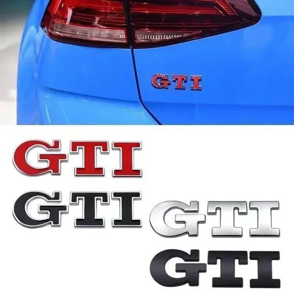 Эмблема надпись GTI для Volkswagen серебристая 79х23 мм металл (на скотче) 95639 фото