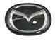 Эмблема решетки Mazda 3 (2013-2016г) черная Хром 141х112 мм под стеклом (на направляющих) 95891 фото 1