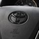 Эмблема руля Toyota 65 x 45 мм пластик Черная (на скотче) 95893 фото 1