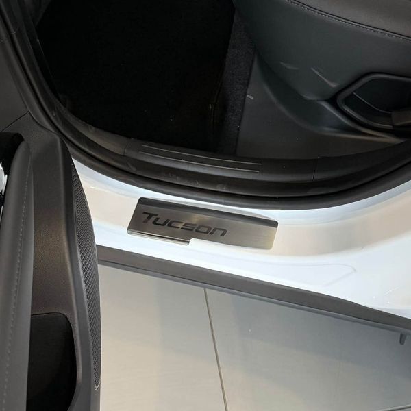 Накладки на пороги для Hyundai Tucson (NX4) 2021- Нержавейка с загибом и Логотипом 4 шт (Premium P-HY25) 96614 фото